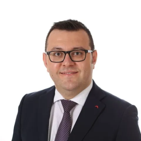 Dr. EMİN ÖZLÜ