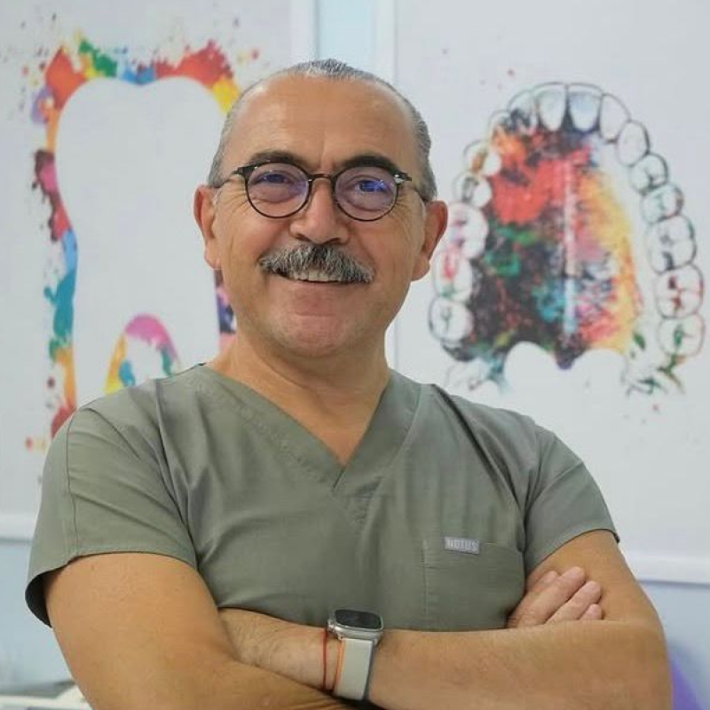 Dt. OZKAN SARACALIOĞLU