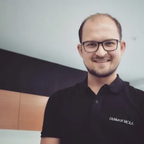 DT. MURAT MOLA