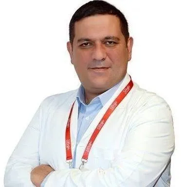 Spec. Dr. NURİ YÜZGÜL
