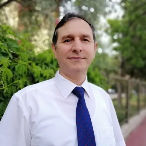 PROF. DR. TÜMER TÜRKBAY