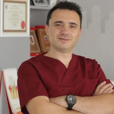 DR. DT. ENVER AKIN ÖZKAN