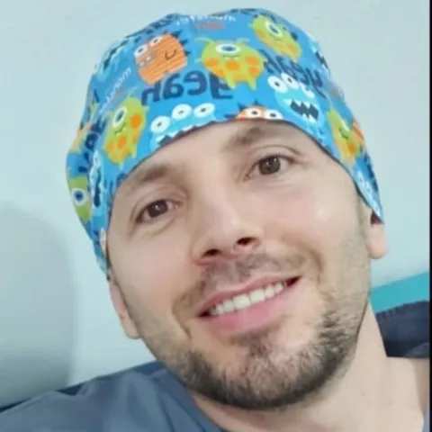 OP. DR. MÜCAHİT KABAR