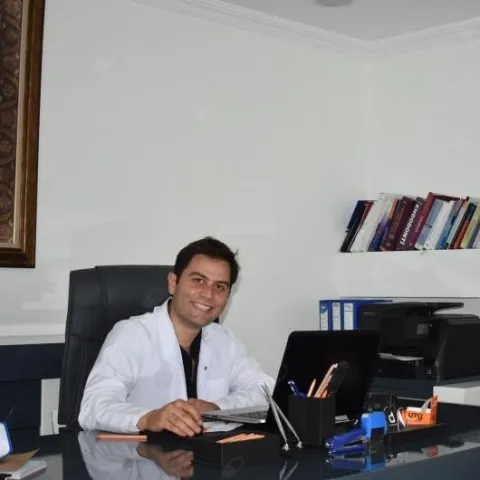Diş hək. KADİR ÖZGÜL