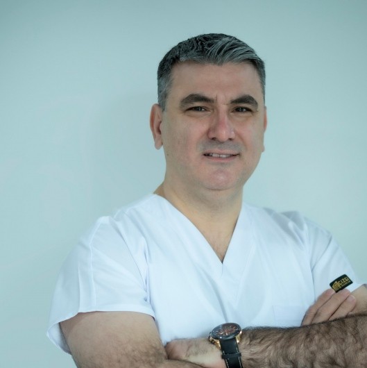 Dos. Dr. ERHAN SARI