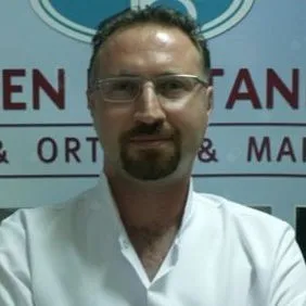 OP. DR. EMRE KORKMAZ