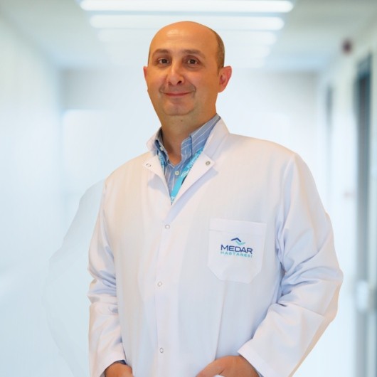 Cərrah Dr. MUSTAFA BAHADIR DİKİCİ