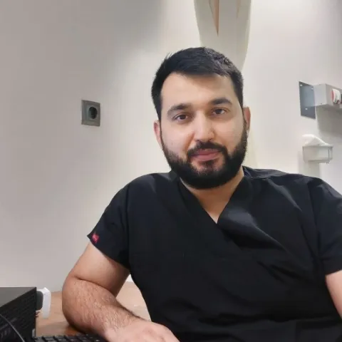 OP. DR. AHMET KARAYİĞİT