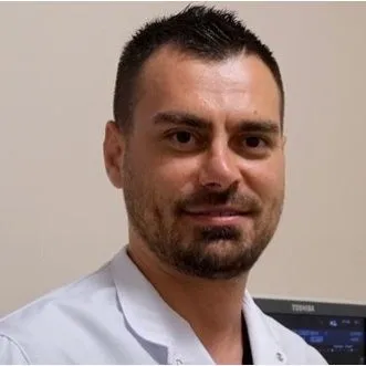 Dr. MUSTAFA BEHRAM