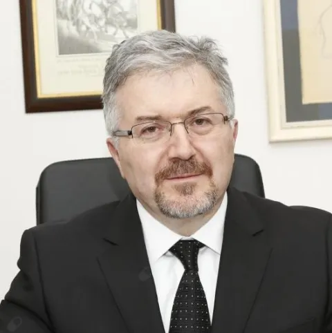 PROF. DR. EKMEL TEZEL