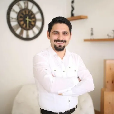 Spec. Dr. MUSTAFA ERKAN