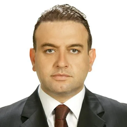 DR. MUSTAFA G. SAYGIN