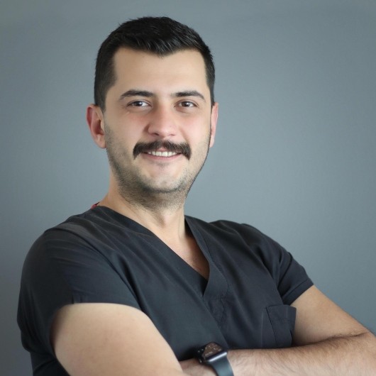 DT. TOLGA TOPAL