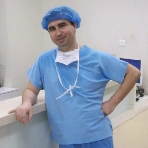 Cərrah Dr. ERHAN KARABUĞA