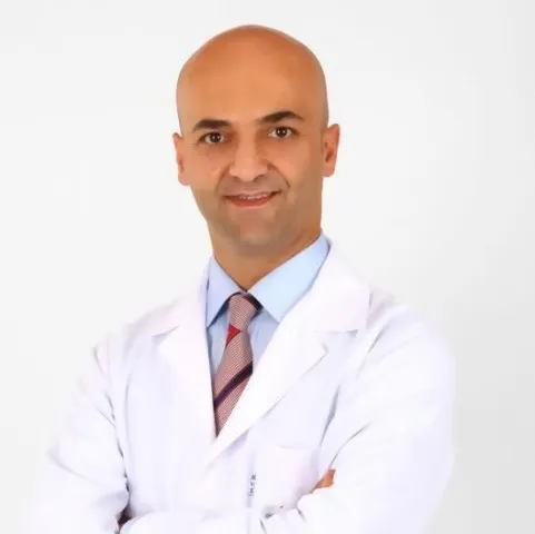Cərrah Dr. MEHMET KERİM ŞERBETÇİ