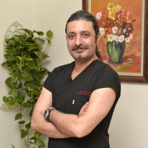 Cərrah Dr. OKAN DOST
