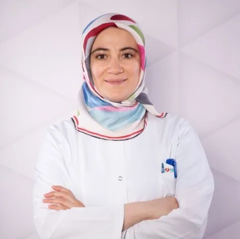 Cərrah Dr. AFRA KARAVELİOĞLU