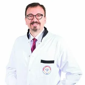 Cərrah Dr. SUAT GENCER