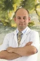 Cərrah Dr. TİMUR UĞURLU