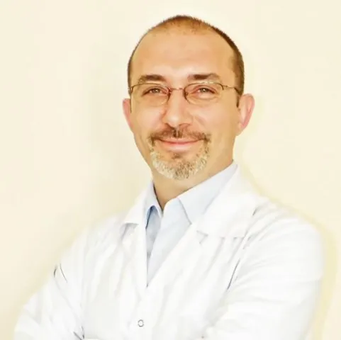 Cərrah Dr. CÜNEYT BARUT