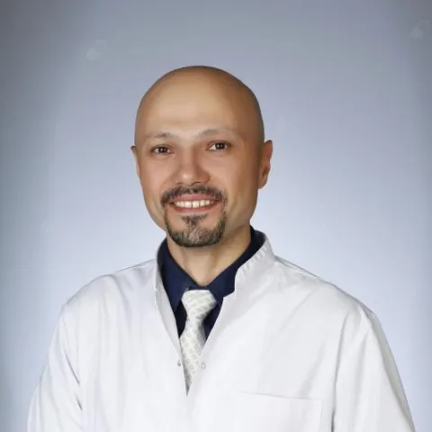 Cərrah Dr. DİNÇER DİNÇ