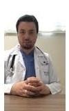 Dr. ERMAN TAMEL