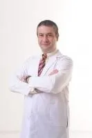 Cərrah Dr. ÖZGÜR KİRİŞ