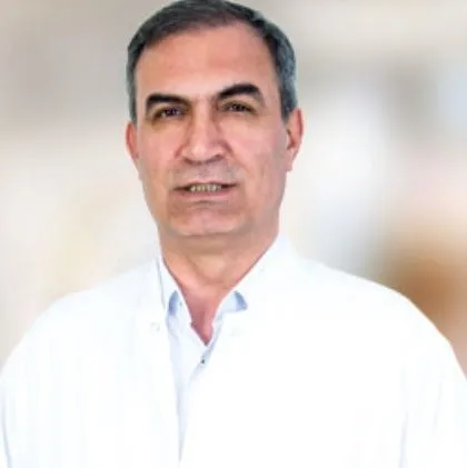 Cərrah Dr. MEHMET ÖZER
