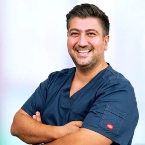 Diş hək. TOLGA AĞCA