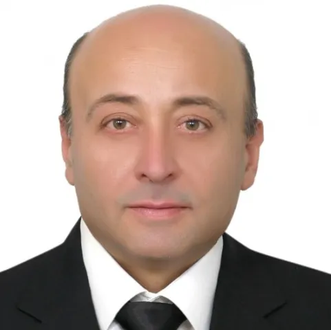Dr. ERCÜMENT TILFARLIOĞLU