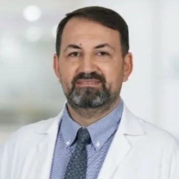 Dr. MEHMET KINACI