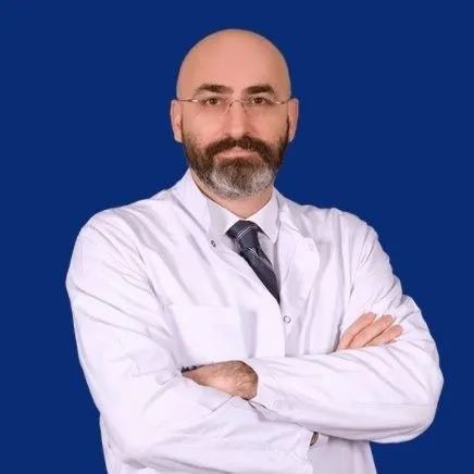 Dos. Dr. EMRE ÖZKER