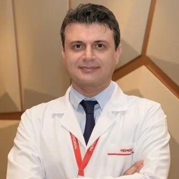 Cərrah Dr. ÖMER FARUK ÖĞE