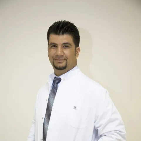 Cərrah Dr. OĞUZ GÜLER